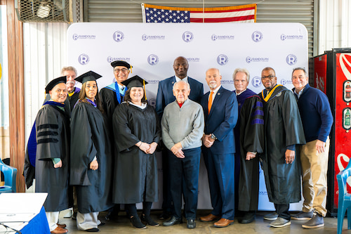 Photo of a group of people at RCC's graduation ceremony at Randolph Correctional facility.