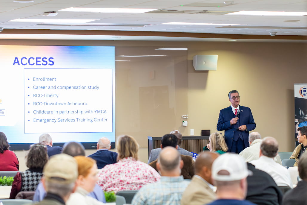 Photo of  Randolph Community College President/CEO Dr. Shah Ardalan giving a presentation in the JB and Claire Davis Corporate Training Center.